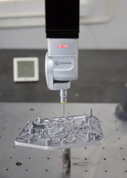 Ruby tip CMM probe undergoing master sphere calibration to ensure measurement accuracy for CNC parts Ruby tip CMM probe undergoing master sphere calibration to ensure measurement accuracy for CNC parts